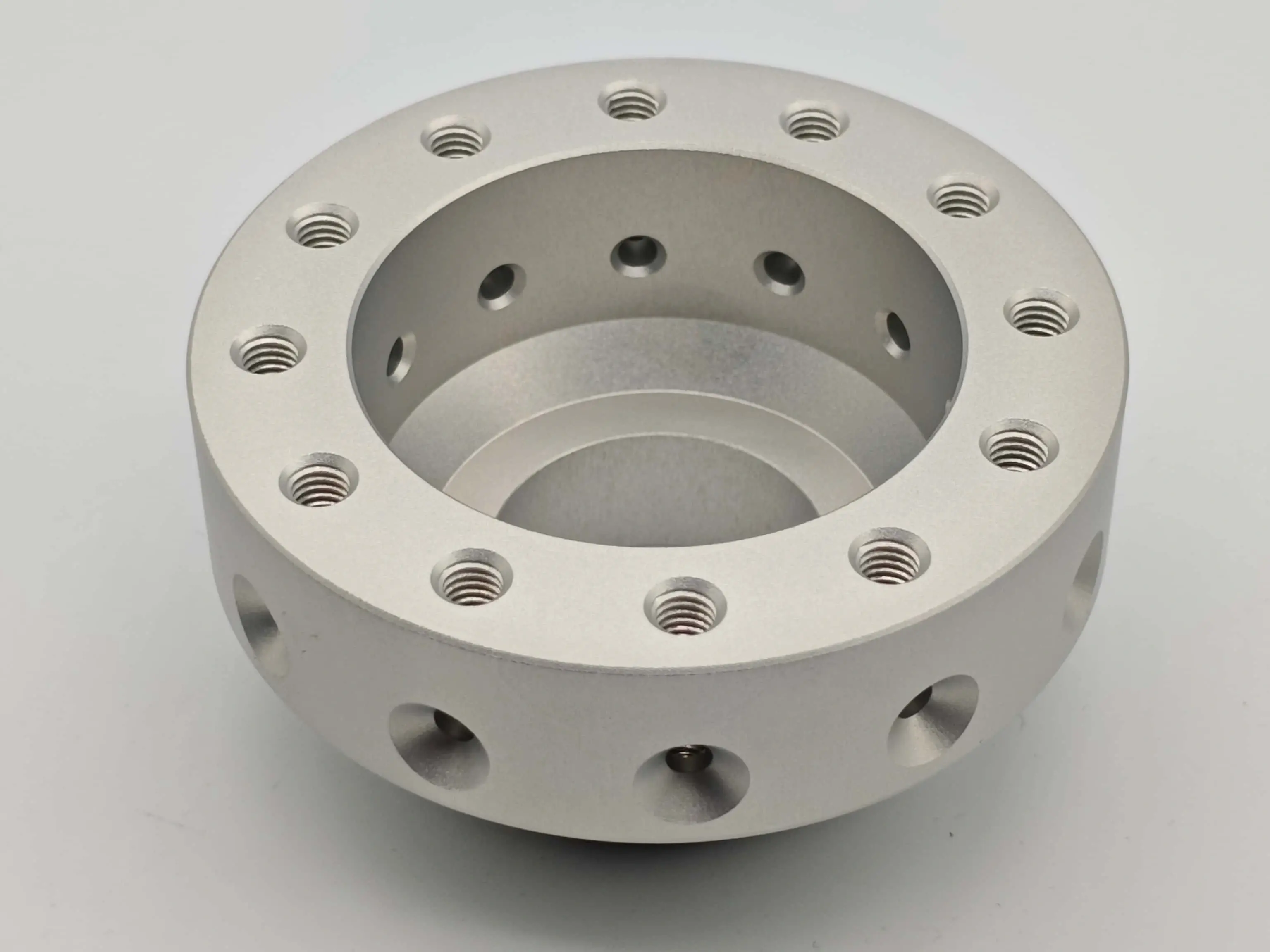 Finished CNC-assisted hybrid manufactured part