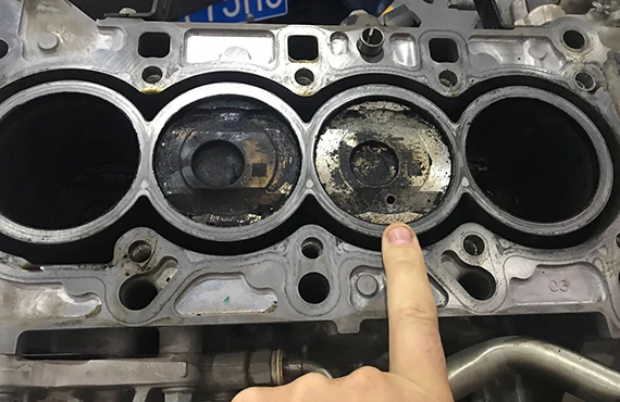 oil leak and a head gasket