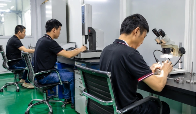 Tuofa Checks Part Cleanliness During Quality Inspection